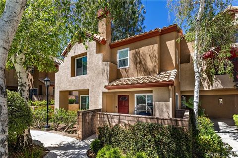 Photo of 22701 Copper Hill Dr #33, Saugus, CA 91350 (MLS # CV26082462)