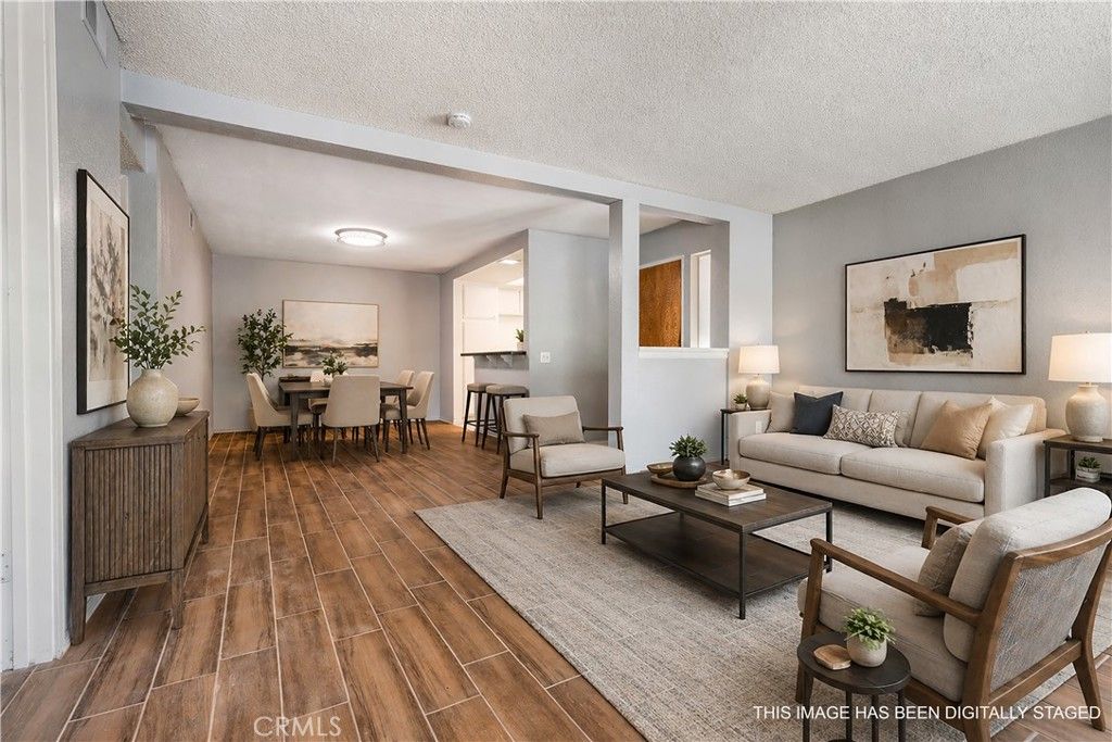 Photo of 16581 Grunion Ln #107, Huntington Beach, CA 92649 (MLS # OC26092066)