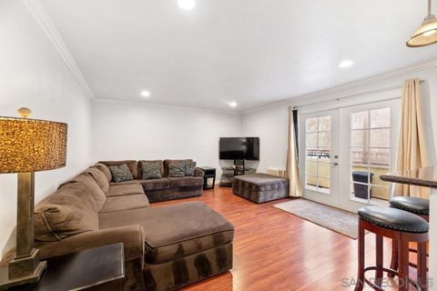 Photo of 5055 Collwood Blvd Blvd #303, San Diego, CA 92115 (MLS # 2600170SD)