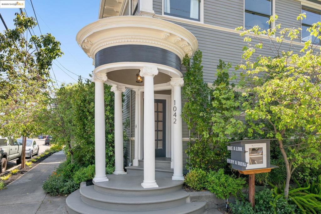 Stately Colonial Revival in the Heart of Alameda Gracefully positioned on a sunny corner lot, this elegant 4++bedroom, 2-bathroom Colonial Revival residence offers timeless style, comfort, and versatility for today's lifestyle. Light-filled living spaces showcase rich original woodwork, beautifully refreshed kitchens and baths, and thoughtful updates that honor the home's vintage character while embracing modern living. The main level features formal living and dining rooms, two bedrooms, and a full bath-ideal for both family life and entertaining. Upstairs, you'll find a primary suite with adjacent office or nursery a second bedroom and second full bath with claw foot tub and classic charm. Outdoors, enjoy the dreamy garden designed by well known landscape architect, Mary Fisher with mature plantings, a bubbling fountain, and a detached powered shed ready for a studio or workshop. Off-street parking for up to three vehicles completes this gracious offering.Ideally located close to top-rated schools, Park St and Webster St shopping and dining, shoreline trails, the ferry, and AC Transit. With a Walk Score of 80, this beautifully maintained home is your gateway to the best of Alameda living.