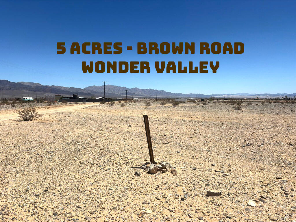 BROWN ROAD, 29 PALMS $18,000.00 - Discover a serene 5-acre parcel nestled in a tranquil environment, surrounded by stunning chocolate-colored mountain ranges. This ranch-style property area is perfect for accommodating horses, dogs, and various other animals, making it an ideal spot for animal lovers. It's also an off-roader's paradise, offering ample space for exploration and adventure. The property is well-connected, with electric poles situated along both the street and the west and south borders. Additionally, it contains what seem to be old survey markers. The land measures approximately 323 X 661 feet and is conveniently located near the Wonder Valley Community Center Park. Owner Will Carry loan of $14,400.00 with 20% down $3,600.00 @ 7% interest amortized over 5 years payable $285.14 monthly plus $15.00 monthly loan service fee. APN#0626-331-48-0000. DIRECTIONS:From Adobe Road go right or east on Amboy Road about a few miles to the community center park take a left on Blower Road go down few miles to right on Brown Road the land is about mile on the right or south side of the road. Look for FOR SALE sign.