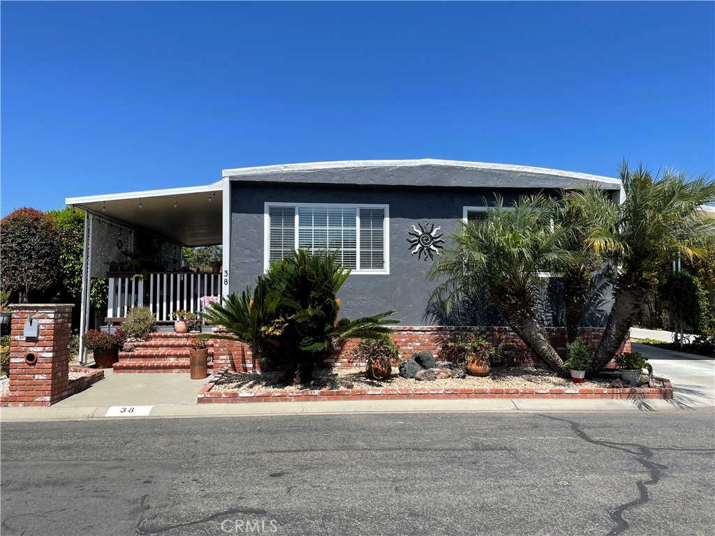 Totally renovated! This elegant open-concept 2-bedroom 2-bath home is located in a premium gated rent-controlled senior community in historic San Juan Capistrano. Enjoy resort living close to Dana Point Harbor and Doheny Beach. The spacious living room has numerous dual-pane vinyl windows, making this home light, bright, and airy. Entertain guests in your beautiful dining room. The gourmet kitchen features a large island, new cabinets, countertops and new appliances. Your roomy master bedroom suite includes a walk-in closet and a luxurious spa master bath with dual sinks, a soaking tub, and a shower. Relax on your oversized Trex deck and enjoy those cool ocean breezes in this sought after premium park location. Call today for your private showing.