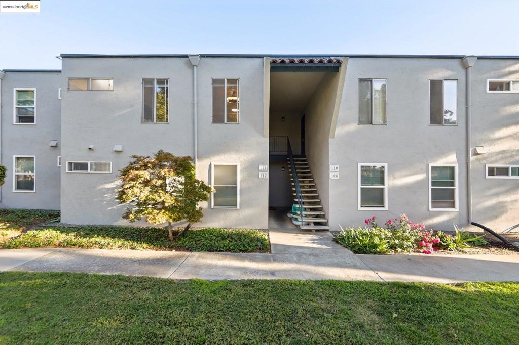 This home offers unbeatable combination of location, amenities and value. Enjoy easy walks to downtown, Trader Joe's, Nob Hill, and scenic hiking/biking trails. Wineries and freeways are just a short drive away. Inside, you'll find an open, light-filled space with a balcony overlooking the Arroyo Creek Bike Path. Recent updates include flooring and modern climate control with window A/C units and a wall furnace. The HOA covers water, sewer, garbage, landscaping, a pool and high capacity, WiFi-operated laundry facilities. You'll also have a dedicated carport. Don't miss this opportunity to join a quiet, friendly community with lovely green spaces- perfect for pets!