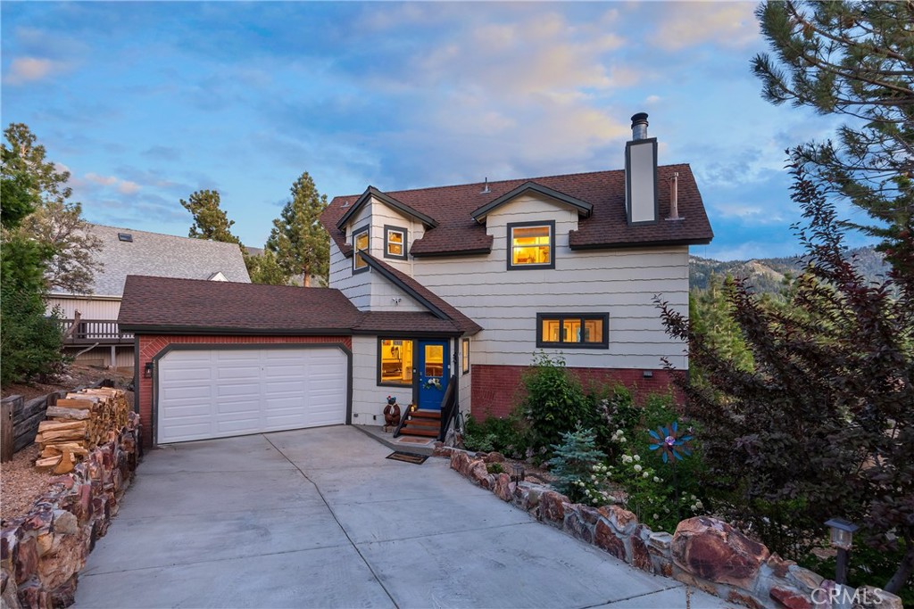 Wide open skies with ASSUMABLE VA LOAN (5.75%)!! Unmatched panoramic views of the mountains, ski slopes, and partial lake views from this spacious Moonridge retreat offering 4 bedrooms, a loft & 4 bathrooms. Enjoy million-dollar vistas from all 3 levels, including the expansive main deck and upper-level master suite, which features vaulted ceilings, stunning scenery, and upper deck access. The chef’s kitchen boasts a premium Viking range and opens to a dining area wrapped in windows that showcase the sweeping vistas. The cozy living room offers a wood-burning stove and an inviting window seat. The spacious main-level deck offers outdoor grilling, dining, relaxing, or soaking in the spa under a billion stars! Downstairs, the game room leads to a brand-new cement patio with an outdoor fireplace—perfect for entertaining year-round. A separate mudroom handles all your winter gear, while the laundry room includes a convenient half bath. There's plenty of room to accommodate all your guests. The attached 2-car garage and off-street parking make this an ideal full-time residence, second home, or vacation rental. Come and experience this rare opportunity to own such jaw-dropping views. Call today to schedule your showing.