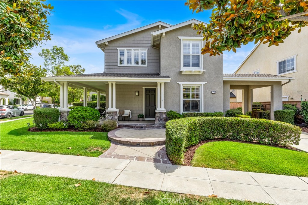 Enjoy the Ladera Ranch lifestyle in this Traditional Craftsman home, located on a unique 6,500 sq. ft. lot in Oak Knoll Village - walking distance to some of the community’s most popular amenities. Exceptionally cared for, this residence features 3 bedrooms, 2.5 bathrooms, and a versatile 4th room: main-floor flex room - perfect as a home office, guest area, or additional family space. This 6,500 sq. ft. corner lot offers privacy, multiple outdoor spaces, and the potential for future additions, with plans outlining options to add just over 800 sq. ft. of living space. Exterior highlights include a welcoming wraparound porch - overlooking a front yard that extends around the side of the home, plus an extra-long driveway with a gated porte-cochere that doubles as secure additional outdoor space, and a low maintenance backyard featuring a built-in BBQ island, turf and privacy hedges. With three access points from the main living area, the indoor-outdoor flow is seamless. Interior finishes include wood floors, new carpet, fresh paint and premium window treatments including: Hunter Douglas Plantation Shutters and Honeycomb Shades. The kitchen provides generous cabinet space, a central island with seating, and under-cabinet lighting. All three bedrooms, along with a laundry room are situated upstairs. The primary suite features a walk-in closet with a custom California Closet system and a true master bathroom with dual vanities, a make-up station, private washroom, and separate tub and shower. The secondary bedrooms, also with built-in closet systems, share a beautifully remodeled Jack and Jill bathroom with quartz counters, a hexagon tile backsplash, new dual vanity, and a new tub with tiled shower. All bathroom fixtures, faucets and appliances are Kohler. Systems Updates include: whole house repipe (copper), tankless water heater, and all electrical outlets updated throughout the home. Best of all is how many amenities are within easy walking distance from this home including: Oak Knoll Clubhouse with 2 pools, a splashpad, and multiple outdoor entertaining areas (recently renovated), Dawnwood Park, Cox Sports Park, Scenic Trails, and the Community Farm (in development). With access to top-rated schools, unmatched amenities, and many annual community events you'll love life in Ladera Ranch. HOA Dues include high speed internet.