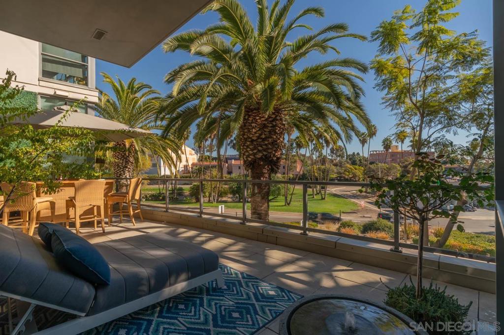 ARIA on top of Cortez Hill. Fabulous residence w/ 14' floor to ceiling windows. 3 bedrooms, 2 sumptuous bathrooms & Huge Laundry ROOM w/ full size washer & dryer. Home receives great natural light throughout. Features an over-sized 30' x 12' private patio, perfect for entertaining a large group or a romantic evening for 2. Includes walk-in pantry, highly upgraded finishes in bathrooms & kitchen, Beautiful hardwood floors & 2 parking spaces. You will love the open floor plan and natural light of this exquisite residence. Owners will consider a LEASE w/ OPTION to PURCHASE. Aria has a lap swimming pool, spa, well-equipped fitness room, community room for entertaining or use as a private meeting space, on-site property management and daily cleaning service of all common areas.