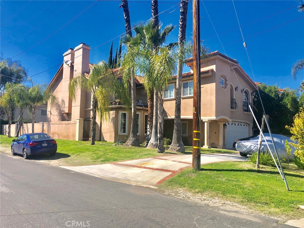 COMES FULLY FURNISHED WITH PAID SOLAR PANELS. Located south of Ventura, within walking distance to coffee shops bars & restaurant, This spacious Mediterranean Villa in the center of Tarzana is the perfect set-up when hanging with family or friends. There are three master bedroom with attached bathroom ,and two extra rooms with a shared bathroom. All rooms are equipped with TV, house is fully furnished. Fully loaded kitchen with three different dining areas. Luxurious backyard with pool & hot tub, seating area, dinning area and a fire pit where you can enjoy a relaxing & quite evening. Just twenty minutes away from Malibu beach and 30 minutes from Universal studio. Ten minutes drive from The Village in Topenga a prime location for brand names stores and lots of dinning and cafe's. This charmer comes fully loaded with all utilities and appliances ready.