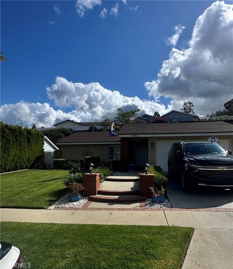Photo of 1932 Adobe Avenue, Corona, CA 92882 (MLS # SW26080043)