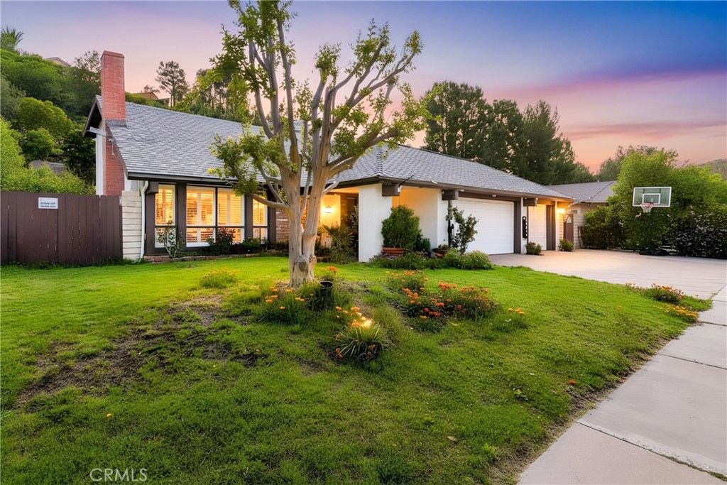 Photo of 24668 Ebelden Avenue, Newhall, CA 91321 (MLS # GD26077046)