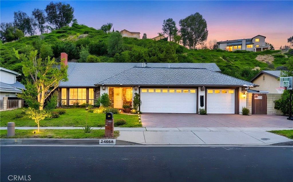 Photo of 24668 Ebelden Avenue, Newhall, CA 91321 (MLS # GD26077046)