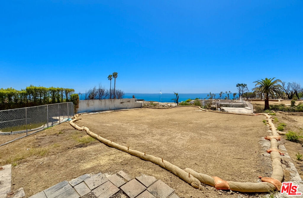 Prime Development Opportunity in Pacific Palisades! Perched on an elevated 9,000+ SF lot in Marquez Knolls, this lot offers views from the Pacific Ocean to the Santa Monica Mountains. Formerly a home, the property has been cleared presenting a rare blank canvas to build your dream estate. Enjoy stunning sunsets, coastal breezes & unmatched potential just minutes from the beach, Palisades Village & scenic trails. A truly special opportunity in one of L.A.'s most coveted coastal enclaves.