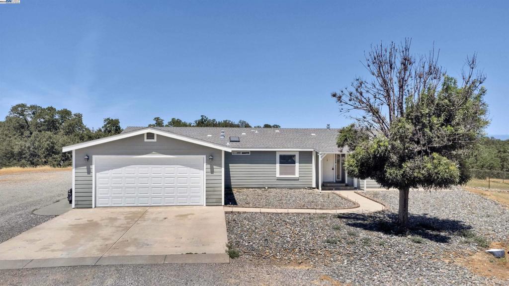 Tucked away on just over 9 acres of serene, usable land, this spacious 2004 manufactured home offers the perfect blend of comfort, functionality, and privacy. With 2,791 sq ft of living space, 4 bedrooms, 2.5 baths, and an attached garage, there’s room for everyone, and everything. Unwind in your own sparkling pool, work or create in the large powered shop, and enjoy peaceful views in every direction. All this, just minutes from town. Whether you're looking for space to spread out or a private sanctuary to call home, this property delivers.