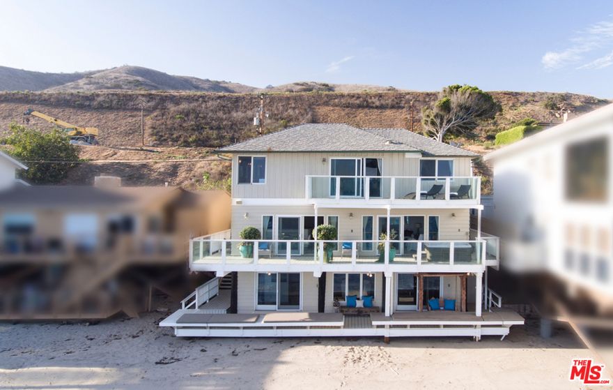 Positioned in the heart of Malibu, this property sets the stage for the opportunity to create an incredible beachfront oasis. Reworked for a masterful redesign in mind, the layout maximizes the opportunity to entertain while taking in the expansive Pacific Ocean views. Spanning over 4,400 square feet across three levels, the home includes 5 bedrooms, 4.5 bathrooms, and walls of glass doors offering access to the numerous terraces and the 50 feet of direct sandy beachfront. This property is ideally situated in one of the most coveted locale's in Malibu.