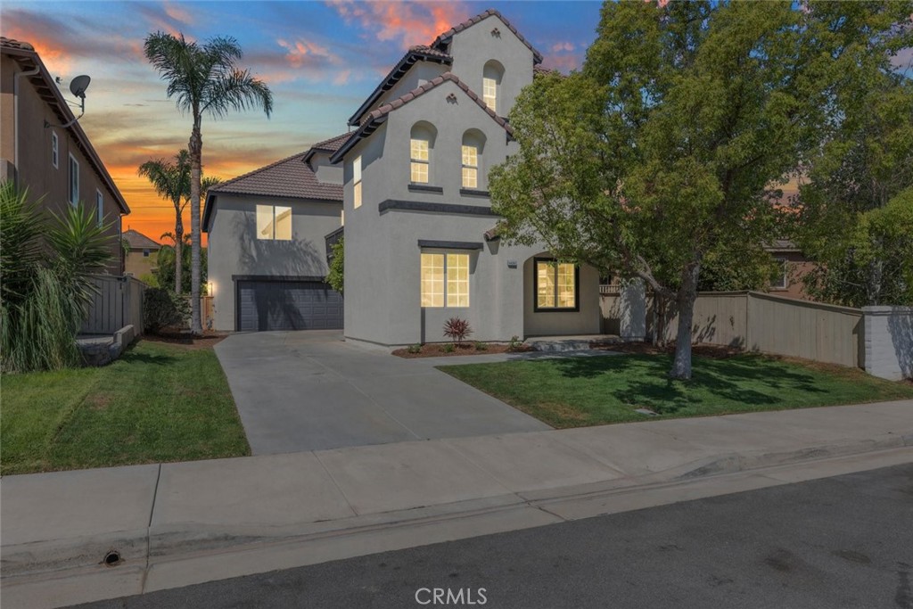 Welcome to this luxurious and impeccably appointed three-story residence, nestled in the heart of South Temecula. Spanning an impressive 4,115 sq. ft., this architectural masterpiece features 5 spacious bedrooms, 3.5 baths, and custom design elements throughout, offering an exceptional blend of elegance and comfort. This home is move-in ready and available for a quick escrow. Step into a grand entryway that leads to formal living and a versatile office or potential guest suite. The main level boasts a chef’s kitchen with all-new custom cabinetry, gleaming countertops, and top-of-the-line appliances, seamlessly flowing into a light-filled family room with serene views of the resort-style backyard. The backyard is a private park-like sanctuary, complete with a sparkling pool and spa, manicured lawn, and low-maintenance hardscaping—perfect for entertaining or relaxing in total privacy. A covered patio with a spiral staircase and a walkout balcony off the primary suite create a retreat-like ambiance that makes every day feel like a vacation.
The second level offers four generously sized bedrooms, including a luxurious primary suite with dramatic high ceilings, dual walk-in closets, spa-inspired bathroom with dual vanities, and an oversized soaking tub. Unique dual staircases create ideal separation—one leading to a private guest retreat with a bedroom, loft, and full bath, and the other reserved for the exclusive entry to the primary suite. Ascend to the third floor and discover a loft space with panoramic views of the Temecula Valley, ideal for a media room, home gym, or creative studio. Each level features its own dedicated HVAC system, allowing for personalized comfort throughout the home. A three-car tandem garage, expansive main-level laundry suite, and an extra-long private driveway—perfect for accommodating guests—complete this exceptional property.
Situated in a coveted neighborhood with top-rated schools, premier dining, and convenient freeway access, this rare gem offers refined living in one of Temecula’s most desirable locations.