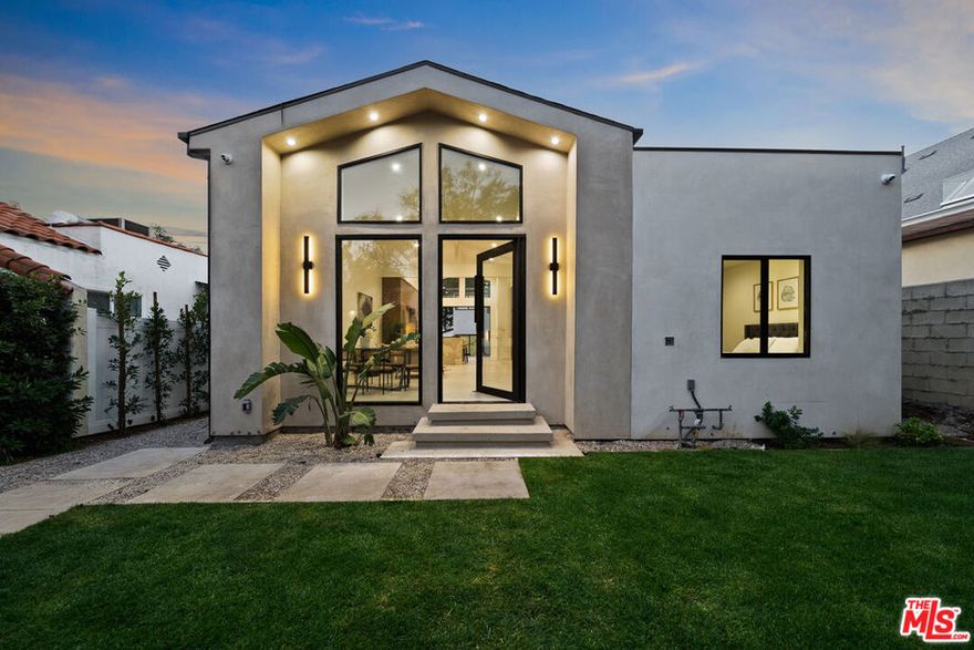 Welcome to an architectural gem in West Hollywood's coveted Norma Triangle, where modern simplicity meets timeless mid-century design. This single-story residence offers 3 bedrooms and 3 bathrooms, crafted with clean lines, warm woods, expansive glass, and an effortlessly neutral palette that fills every room with natural light. The open layout blends indoor and outdoor living, perfect for quiet relaxation or chic entertaining.A separate two-story ADU adds remarkable flexibilityideal as a guest home, creative studio, or income opportunitydesigned with the same refined aesthetic and curated finishes. Private, quiet, and set in one of L.A.'s most walkable neighborhoods, this home is the perfect blend of style, function, and West Hollywood lifestyle.