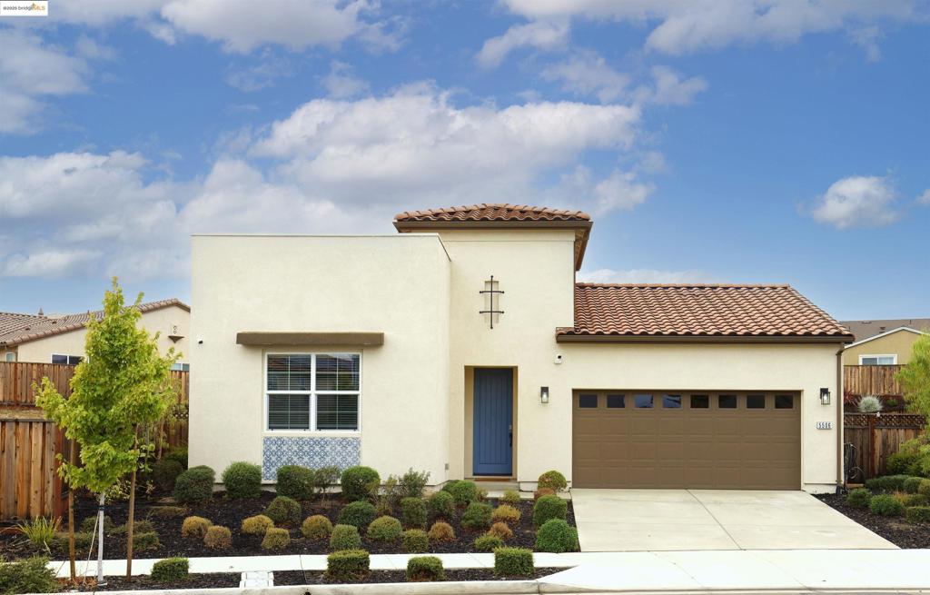 Welcome to 5506 Monte Vista Way, a nearly new single-story home in The Hills, one of Antioch’s most commuter-friendly neighborhoods—just minutes from Highway 4, BART, Trader Joe’s, and Target. This modern 4-bedroom, 3.5-bath residence offers an open-concept , a junior suite with private bath, owned solar and a spacious kitchen pantry and a 220V car charger. Both the great room and primary suite open to the backyard through sliding doors, filling the home with natural light and creating seamless indoor-outdoor living. The backyard is unfinished, offering a blank canvas for buyers to create their own outdoor retreat. Ideally located minutes from Lone Tree Plaza, Slatten Ranch Shopping Center, and Antioch’s dining options, with quick access to Contra Loma Regional Park, Black Diamond Mines Preserve, Highway 4, and the Antioch BART Station, this home combines modern comfort, convenience, and single-level living at its best. Backyard photo is a rendering.
