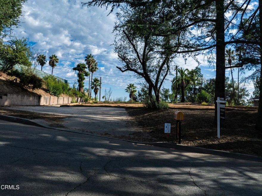 Great views to downtown LA on this flat private 14,101 sq. ft. lot. Close to local trails and parks. It was previously home to a 3051 sq ft residence with the best of nature and tremendous views. Looking for a new person to resurrect it to a new glorious state. Buyer to verify all zoning, permitting, rebuilding requirements,and status of utilities. Buyer is responsible to investigate future development, environmental toxicity, ability to add units and all things needed to rebuild on this site.