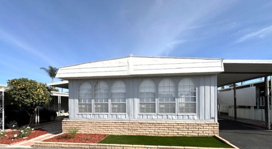 55+ Gated Community. This 2 Bed/ 2 Bath is a complete remodel. Stainless Steel Appliances, new counter tops, island in the kitchen. New fixtures lighting, flooring.  Very open floor plan and large windows with new window coverings. Large front covered patio with a view of the Idyllwild mountains. The Park offers two clubhouses, swimming pools, enclosed jacuzzi, TV room, conference room, exercise room, barbecue area and more. Affordable park rent of $689. Come retire in a nice, peaceful, quiet park.