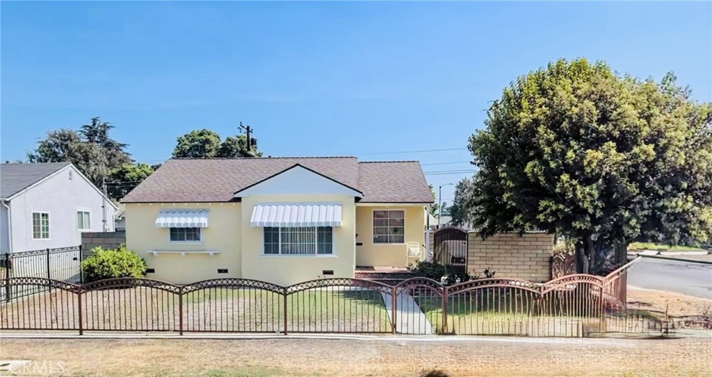 Charming opportunity in the heart of Pico Rivera! This spacious 4-bedroom, 2-bath home offers over 1,450 sq ft of living space on a generous 5,200+ sq ft lot. Perfect for buyers looking to personalize or invest, this property features a functional layout, good-sized bedrooms, and plenty of natural light. The large backyard offers endless possibilities for outdoor living or future expansion. Located on a quiet residential street near parks, schools, and shopping. A true gem with great potential—bring your vision and make it your own!