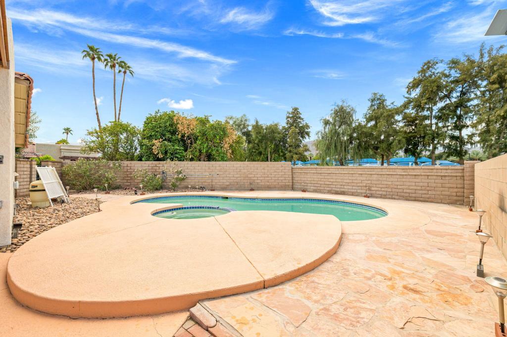 Welcome to this charming single-level home located in the heart of Palm Desert with NO monthly HOA!Stepping through the private gated courtyard you will find 3 bedrooms, 2 bathrooms, with just over 1,150 sq. ft. of comfortable living space perfect as a primary residence or desert getaway!Inside is light and bright with plantation shutters and easy-care tile flooring. The kitchen is warm and inviting with beautiful wood cabinetry, granite countertops, stainless steel appliances, and plenty of storage.Enjoy sunny days with your private pool and spa, with lots of space for outdoor dining, barbecues, or simply lounging.Added bonus- front row to the firework show at COD from your backyard!With a one-car garage, covered carport, and a storage shed, this home is both charming and practical--ready to welcome its next owners.Don't miss the chance to make this special home yours--schedule a showing today and see why it's the perfect place to start your next chapter!