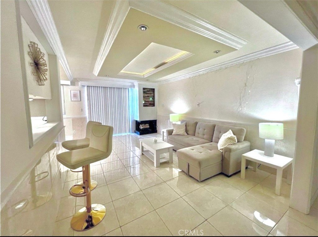 Priced to Sell! Location, location, location! Welcome to this charming 770 sq ft condo, perfectly designed for modern living! This cozy 1-bedroom, 1-bath unit boasts stylish tile flooring throughout and comes furnished, making it move-in ready. Enjoy the convenience of having not one, but two dedicated parking spaces—one inside the garage and one outside. This unit comes with a fully permitted Tesla Universal EV Charger making it easy to charge ANY electric vehicle at home. Enjoy upgrades throughout the unit - Brand new Quartz countertops in the kitchen, new built in sink, and a new gas cooktop with washer/dryer in unit! The primary bedroom has brand new flooring, furniture and elegant mouldings! This complex is located right next to a shopping plaza with Albertsons, Starbucks and restaurants. Parks are within walking distance and right across the fabulous Palos Verdes. Great QUIET neighborhood!