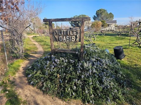 Photo of 9878 Wilson Ranch Rd, Phelan, CA 92371 (MLS # GD26064238)