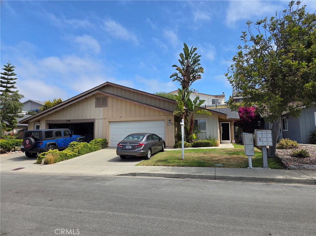 This inviting single-level 2-bedroom, 2-bath twin home offers the ideal blend of comfort, style, and convenience—just minutes from the beach, shopping, and oceanfront dining. Highlights Include: Bright, Open Floorplan: Filled with natural light, featuring a spacious living room and a welcoming dining area perfect for entertaining. Outdoor Living: Easy access to a private backyard through a sliding glass door that opens to a beautiful wood deck—ideal for afternoon relaxation. Generously Sized Bedrooms: Both the primary and secondary bedrooms offer ample space and comfort. Attached Two-Car Garage: Includes extra storage and convenient in-home laundry hookups. Desirable Neighborhood: Located in one of Pismo Beach’s most sought-after communities. Whether you're seeking a vacation retreat or a full-time coastal residence, this home delivers location and charm in one beautiful package.