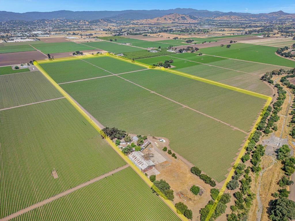 Don't miss this rare opportunity to own an exceptional investment or agricultural property approximately 84 usable acres in a prime South County location! This offering includes three contiguous parcels (APNs: 835-16-016, 835-16-005, and 835-16-003), totaling approximately 84 acres. The sale includes all three parcels, along with several mobile homes/trailers, one Agricultural Well, One Domestic Well, barns, and sheds. offering excellent potential for farming, rural living, or long-term investment. Ideally located just minutes from Gilroy Premium Outlets and major retailers like Costco, Lowes, and Home Depot, with easy access to Highway 101. This property is only about 35 minutes from Silicon Valley. Situated in the fast-growing community of Gilroy, the area is highly desirable for both agricultural and investment purposes, blending peaceful rural surroundings with convenient access to major markets and amenities. With flat, usable terrain and an existing agricultural well, this versatile property is perfect for farming, establishing a rural estate, or holding for future appreciation. An outstanding opportunity for growers, investors, or anyone seeking land in one of the regions most sought-after agricultural zones.