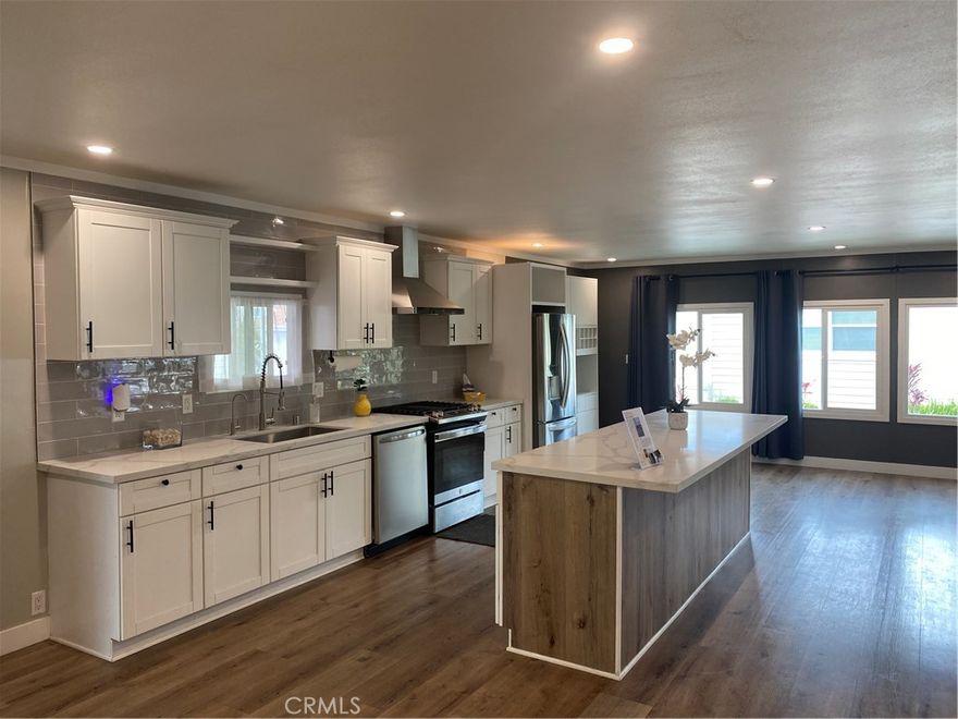New Lower Price 7 Magnolia Via in Anaheim, where comfort meets convenience in a fantastic community setting. This doublewide unit offers a spacious and well-maintained property that's both pet-friendly and perfect for all ages. Home boasts 2 bedrooms, 2 bathrooms, and 1344 sqft, providing ample space for comfortable living. The spacious deck and yard are standout features, creating an ideal outdoor retreat. Additionally, there is a storage shed and a carport with parking for 2 vehicles. This property is part of a vibrant community that offers a range of amenities, including dog parks, pool, spa, and a clubhouse with a game room. The convenience of on-site facilities like a laundromat adds to the ease of living. The location of this property is unbeatable, close to shopping, dining and freeways! As a bonus, this home comes fully equipped with essential appliances, including a washer, dryer, refrigerator,  dishwasher and hardwood floors throughout. For Added Safety This home is also equipped with an EarthQuake bracing system.  The storage shed provide additional space for your convenience. Experience the best in community living. Don't miss the opportunity to make this well-appointed property your home. Monthly space rent is 2180.00 Home is to be sold as is.
