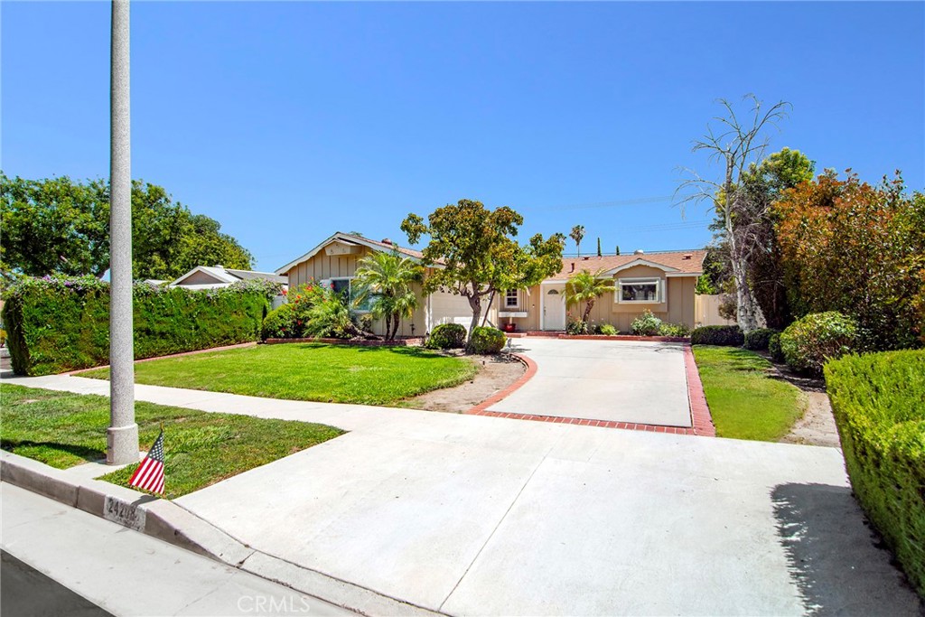 Charming 3-bedroom, 1.5-bath home in desirable West Hills! This light-filled residence features an open floor plan with hardwood floors, neutral carpeting, crown molding, and a chef’s kitchen with granite center island, stainless steel appliances, and ample cabinetry. French doors in the living room lead to a spacious backyard, ideal for entertaining, with a beautifully crafted covered patio. Garage has been converted into a bonus living area with storage and laundry. Located near award-winning schools—don’t miss this opportunity!