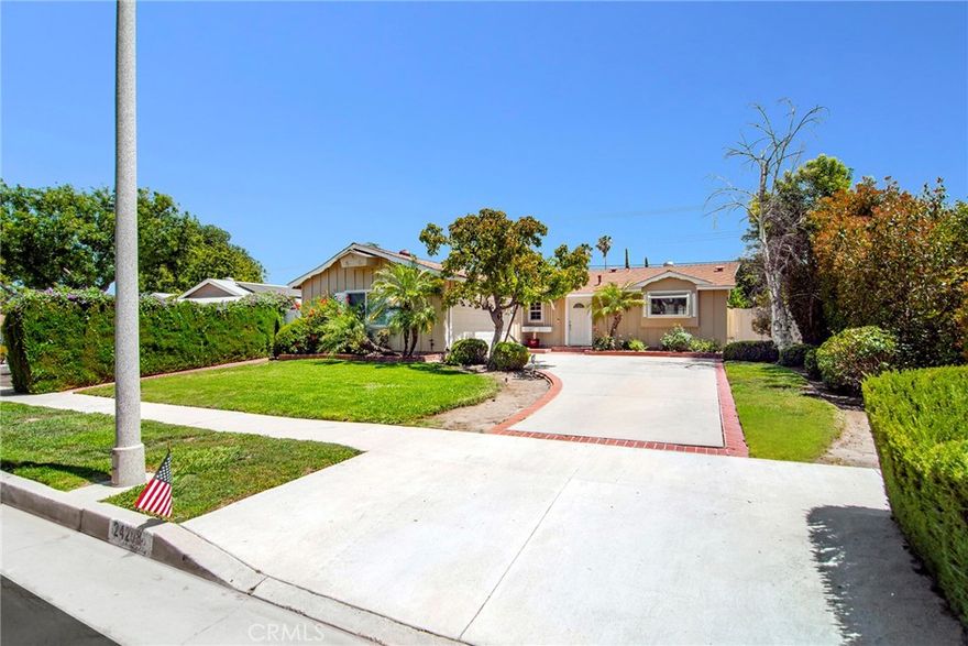 Charming 3-bedroom, 1.5-bath home in desirable West Hills! This light-filled residence features an open floor plan with hardwood floors, neutral carpeting, crown molding, and a chef’s kitchen with granite center island, stainless steel appliances, and ample cabinetry. French doors in the living room lead to a spacious backyard, ideal for entertaining, with a beautifully crafted covered patio. Garage has been converted into a bonus living area with storage and laundry. Located near award-winning schools—don’t miss this opportunity!