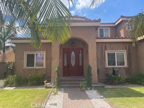 Photo of 9114 Irwingrove Dr, Downey, CA 90241 (MLS # CV25215817)