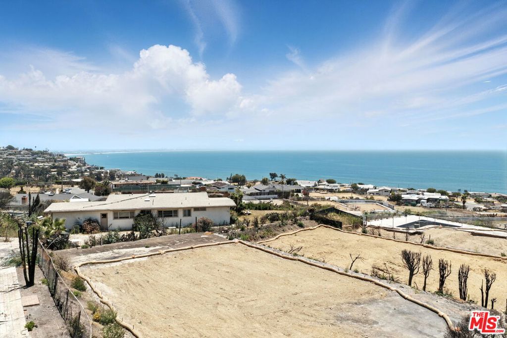 Generous and flat lot with views awaits your dream build. Nestled in the serene Sunset Mesa neighborhood of Malibu, with a previous home of 1,968 sqft., the possibilities are endless for designing a luxurious retreat tailored to your lifestyle. Phase 1 & Phase 2 clearances are complete. This remarkable property is surrounded by stunning mountain vistas and offers partial ocean views, presenting a unique opportunity for you to create your dream home. Convenient location ensures you're just moments away from the best that Malibu, Pacific Palisades, and Santa Monica have to offer including pristine beaches, scenic hiking trails, and access to the highly regarded Santa Monica-Malibu Unified School District.