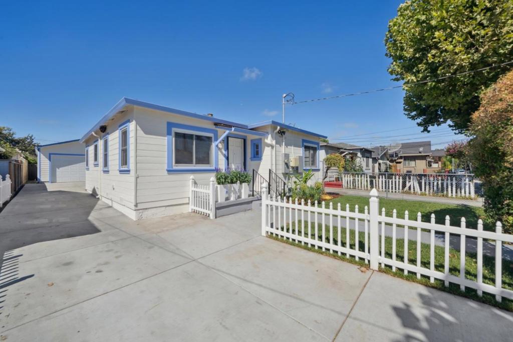 Welcome to 1157 Plum Drive, a charming 2BD/1BA home in San Jose with modern updates and vintage character. Freshly painted inside & out, this home features Hardwood floors, new waterproof laminate, Central heat/AC, and an owned solar system, Pelican water Filtration System. The updated kitchen includes GE stainless steel appliances, recessed lighting, and attic storage access. Both bedrooms offer Walk-in closets, while the bathroom boasts a newer vanity, Toto washlet, and shower over tub. Additional highlights include stacked LG washer/dryer, a Dutch door to the yard, and an Extra large permitted 2-car Garage/Workshop (completed 2024) with 240V EV outlet and separate 200 amp Sub Panel. Outdoors, enjoy a Private patio, new Sod with sprinkler system, and access to an unfinished basement. Conveniently located near 280/101/87 and schools: Washington Elem, Willow Glen Middle & High. Move-in ready with classic vintage touches like glass door handles, built-in ironing board, and original mail slot.