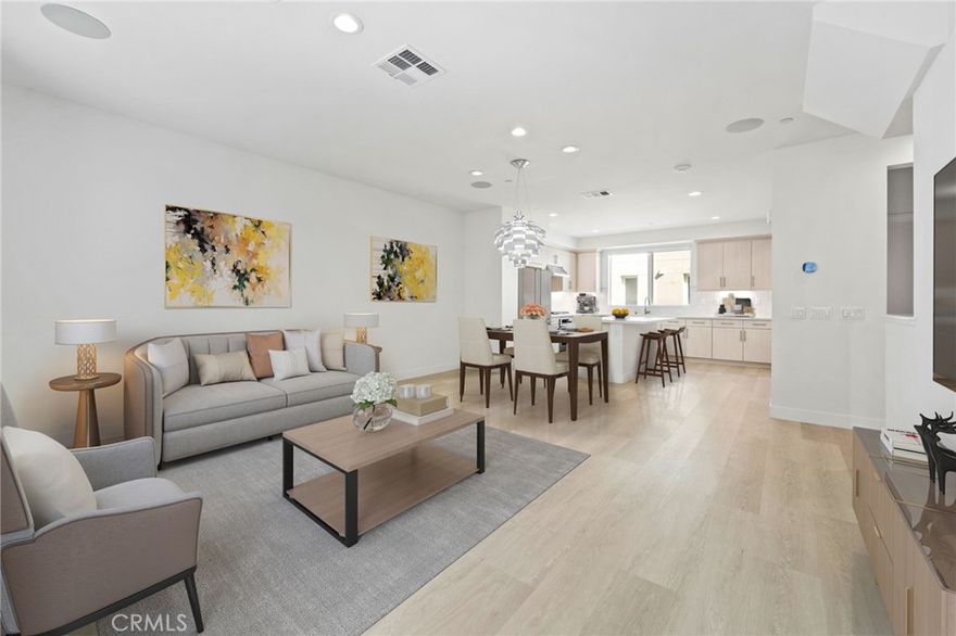 Welcome to 169 Steely, a modern and turnkey 3-bed, 2.5 bath home located in the highly coveted Paseo Del Mar community, right in the heart of the Irvine Business District! One of the most highly upgraded homes around, each detail has been carefully hand-selected from the highest quality materials, from the ultra-wide luxury vinyl flooring to the sleek, flat panel cabinets all throughout the house. The kitchen features high-end KitchenAid appliances, under cabinet lighting, quartz carrara countertops, soft-close cabinets, and a roomy walk-in pantry. The bright and spacious family room is ideal for entertaining, including a Klipsch Theater speaker package for the ultimate surround sound experience. Even the staircase has been an upgraded with a horizontal steel rail system for an elevated look. All 3 bedrooms are tucked away upstairs, highlighted by the primary suite which comes with zebra window shades, recessed lights, and a massive walk-in closet. A convenient laundry closet completes the top floor. One of the best features of the home is a versatile bonus room on the first floor that may be used as an office or converted into a 4th guest bedroom. The attached 2-car garage and nearby street parking provides ample parking for you and all your guests. The Paseo Del Mar community offers various resort-style amenities such as a pool, spa, covered cabanas, bbq-areas, as well as a central location to Diamond Jamboree, The District, and UC Irvine. Conveniently located near the 55 and 405 freeways, as well as John Wayne airport. Come see 169 Steely today!