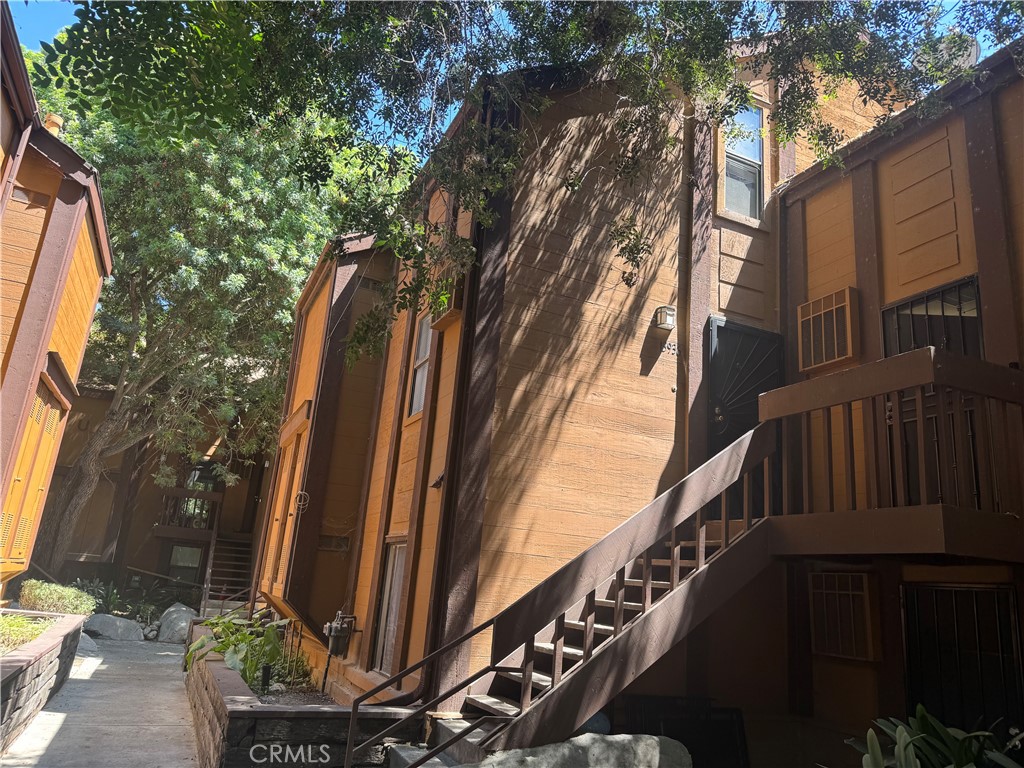 Fantastic opportunity to own this charming condo in the gated Benton Bay community in the City of Norwalk. Pride of ownership shines throughout this beautifully maintained 1-bedroom, 1-bathroom unit which includes in-unit laundry. Located in a peaceful interior spot within the complex, the condo is conveniently close to the pool. Enjoy views of the tranquil creek from your private balcony-a perfect place to relax and take in the surrounding natural beauty, including scenic streams and waterfalls.
The condo has been thoughtfully updated with new flooring, a remodeled bathroom, and fresh paint throughout. Every upgrade was completed with great care and attention to detail. Community amenities include a pool, spa, gym, tennis courts, and approximately 3 miles of walking paths.