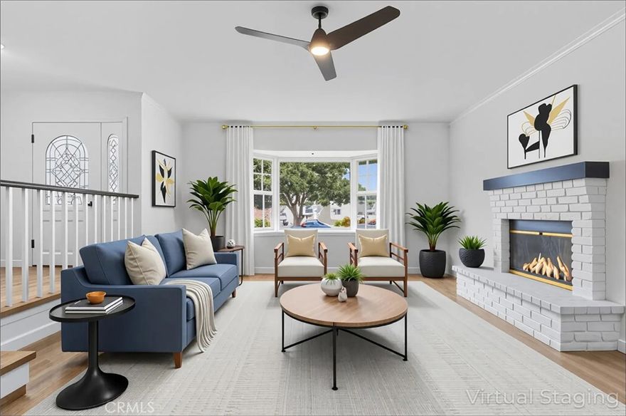 Immerse yourself in this impressive, recently remodeled 3-bedroom, 2-bathroom home that feels like a 4-bedroom. High ceilings in the great room and kitchen area provide a dramatic look to the already impressively designed kitchen and dining area. This very spacious home has ample space in each bedroom, ensuring each individual has room in their own space. There are too many upgrades to mention. The sleek black and white look throughout, even to the fireplace, provides the aesthetics to want to leave your furniture behind and just bring your clothes to move in. It's that ready for you. Come home! This home won't last.Check out all that NEW APPLIANCES Stove has 6 burners..... so much more 



Please note home has been Virtually staged in some photos.