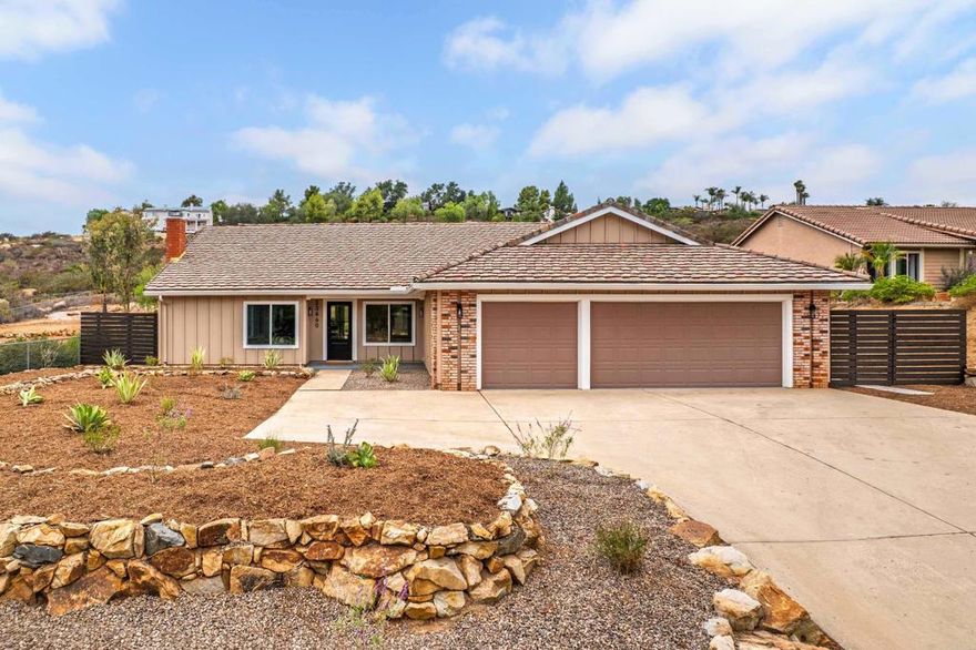 Stunning Single-Story Remodel in San Diego Country Estates.   Welcome to this beautifully remodeled single-story home in the heart of Ramona’s highly sought-after San Diego Country Estates. Every detail of this residence has been thoughtfully upgraded, blending modern sophistication with everyday comfort.   Step inside to discover bright, open living spaces with vaulted ceilings, new flooring, and a striking fireplace wall clad in shiplap that anchors the room with warmth and style. A separate family room provides additional living space that complements the open-concept floor plan—ideal for relaxing or entertaining.   The redesigned kitchen is both stylish and functional, featuring quartz countertops, stainless steel appliances, elegant lighting, and a spacious white oak island surrounded by crisp white shaker cabinets.   The luxurious primary suite offers a true retreat, featuring a spa-inspired en-suite bath with dual vanities, marble-style counters, gold fixtures, and a glass-enclosed shower. Three additional bedrooms are filled with natural light and share a beautifully remodeled full bathroom with ample counter space, updated fixtures, and a cohesive, modern design.   Set on nearly half an acre, the large backyard is ready to enjoy with a cozy designated fire pit area and beautiful mountain views—perfect for relaxing evenings outdoors.   Located within the prestigious San Diego Country Estates, residents enjoy resort-style amenities including golf, tennis, swimming, equestrian facilities, hiking trails, parks, and nearby wineries—all surrounded by Ramona’s scenic beauty.   If you’ve been looking for a move-in-ready home with luxury finishes, mountain views, and a relaxed country lifestyle, this is it.