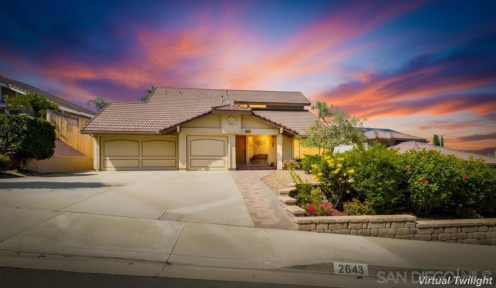 It's not just a home, it's a lifestyle at its finest! Highly sought-after 4 bedroom Cottonwood home with breathtaking mountain/city light views! Meticulous care and detail abounds the minute you arrive! Fall in love with the lush mature landscape with bright, beautiful flowers! Take a break on the front porch with custom brick sidewalk and take in the breathtaking views! Formal entry opens to big living room to your right with oversized windows allowing for an abundance of natural light, stunning views, plus extra high vaulted ceilings! Living room opens to dining area with window seating and plenty of room to enjoy family dinners! Incredibly light and bright kitchen with ample counter and cabinet space, breakfast bar seating, gas cooking, stainless refrigerator/dishwasher, and lovely view of lush backyard! Kitchen opens to large family room with cozy fireplace with custom mantle and slider out to backyard! 1 bedroom downstairs and full bath-ideal for in-law, teen, or guests! Extra large primary suite with more amazing light, big balcony to enjoy your morning coffee, and completely remodeled en-suite bath! Nicely sized additional bedrooms-one could be office, gym, man-cave+! Don't miss the remodeled 3rd bath too! Unbelievable private, quiet backyard that will be your perfect sanctuary! Great covered patio, lush green landscape, orange and guava fruit trees, firepit for cooler evenings, and plenty of room for kids, pets, and entertaining! Details not to miss- 3 car garage, central HVAC, double paned windows, newer stucco, and upstairs attic with loads of space+! Quick walk to area parks! Make this YOUR home before someone else does! Welcome Home!