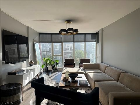 Photo of 411 W Seaside Way #302 Way, Long Beach, CA 90802 (MLS # SB26052414)