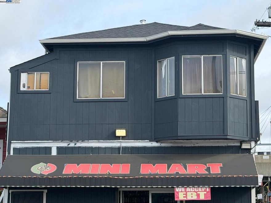 Prime mixed-use opportunity directly across from Fruitvale BART and Fruitvale Village. This corner property offers strong visibility, walkability, and immediate rental income from two tenant-occupied units. The upstairs residential unit is a well-maintained 2-bedroom, 1-bath apartment currently rented below market. The ground-floor commercial space is leased through next year, providing stable income with the option to renew or reposition for future upside.  The property features separate gas, electric, and water meters, and fenced parking for 4+ cars. Two large high-exposure billboards on the building offer additional income potential, with visibility from San Leandro Street and near the BART line. Zoned Commercial/Mixed Use/Office/Residential, the building provides excellent flexibility for investors or owner-users seeking a transit-oriented, income-producing asset.  Located steps from BART, shops, restaurants, and major commuter routes (880, 580, 238, 80), this is a rare chance to secure a versatile property in one of Oakland’s most active investment corridors.