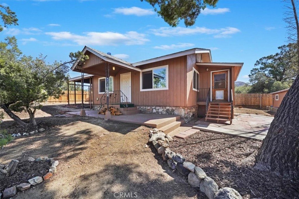 Escape to the serenity of Mountain Center with this unique property at 69777 Sugarloaf Ave, just 25 minutes from Palm Desert and 30 minutes from Idyllwild. Featuring two charming mid-century cabins, this retreat is surrounded by mature Pinyon pines and offers a picture-perfect view of Toro Peak, one of California’s most iconic hiking destinations.
The main dwelling, originally built in 1954, has been thoughtfully expanded to 1,096 SQFT. Inside, you’ll find a rustic wood-paneled living room with the original stone fireplace and mantle, two cozy bedrooms with private ensuites, and two updated baths. A laundry room with storage completes the main home.
A 1-bedroom, 1-bath casita adds 400 SQFT of versatile space, attached garage/workshop, and detached covered carport—perfect for guests, an Airbnb, or creative workspace.
Upgrades include some new windows, a RHINO 5-stage whole-house well-water treatment system, and a recently installed generator panel for a mobile generator. The property is fully fenced, with a private well, septic, and propane tank.
Set on an 11,761 sq. ft. lot, this home offers ample space for landscaping, projects, and outdoor enjoyment. Experience the abundant local wildlife, from owls and blue jays to farm life, and enjoy cool mountain breezes, winter snow, and the fragrant Pinyon Pines after rain. Adventure awaits with nearby hiking trails and easy access to Idyllwild, Garner Valley, and Lake Hemet.
This home is not just a property—it’s a lifestyle. Enjoy the privacy, the beauty, and the friendly, welcoming Mountain Center community. Live in one cabin and rent the other, use both as a year-round retreat, or embrace a weekend getaway—the possibilities are endless.