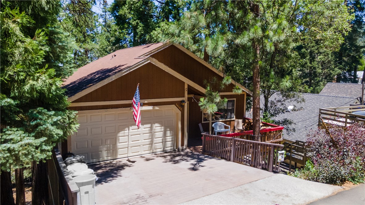 This home has the perfect Ingress and Egress- access to the main highway. Welcome to this gorgeous mountain home just minutes away from Lake Gregory. If you are not a fan of the heat, this cozy cabin like home will treat you well. As you enter through the front door you are greeted by the freshly painted (NEW 2021) vaulted ceilings, (NEW 2021) vinyl plank flooring (LVP), & a cozy fireplace. Entering into the (NEW 2022) remolded kitchen, you will find Quartz countertops, black stainless steel door handles, all NEW appliances (which are included), and a gorgeous view of the backyard. Main floor also features 1 half bathroom. Following down the stairwell is the second level of the house, featuring 3 bedrooms and 2 bathrooms which have been renovated. One of the great features this home has to offer is a (NEW May 2022) 2 car garage and a large, gated backyard to keep your family or pets safe. NEW balcony 2025, NEW stairs rear 2025.