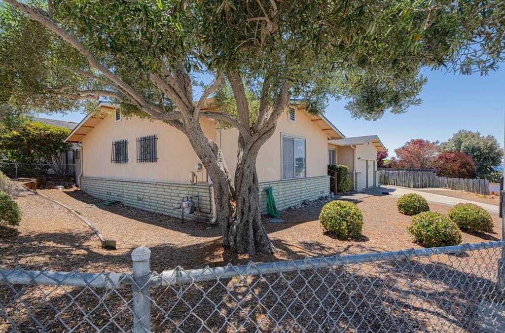 Opportunity Knocks! With much needed TLC, upgrades and your creative touch, the possibilities are endless with this 3-bedroom, 2-bath single story home that sits on a 6,250 square foot corner lot in upper Seaside neighborhood. The layout offers great bones and plenty of space for reimagining the interior. Step down from the galley kitchen into the family room featuring a large slider opening to the backyard, gas starter fireplace and entrance to the spacious 2-car garage. The roof, gutters and water heater have recently been replaced. Home is being sold as is and buyer will take responsibility for any violations/government retrofits that need to be done. Don't miss this rare opportunity to create something truly special in a prime location near highways, parks, beaches, restaurants, and all that the Monterey Peninsula has to offer.