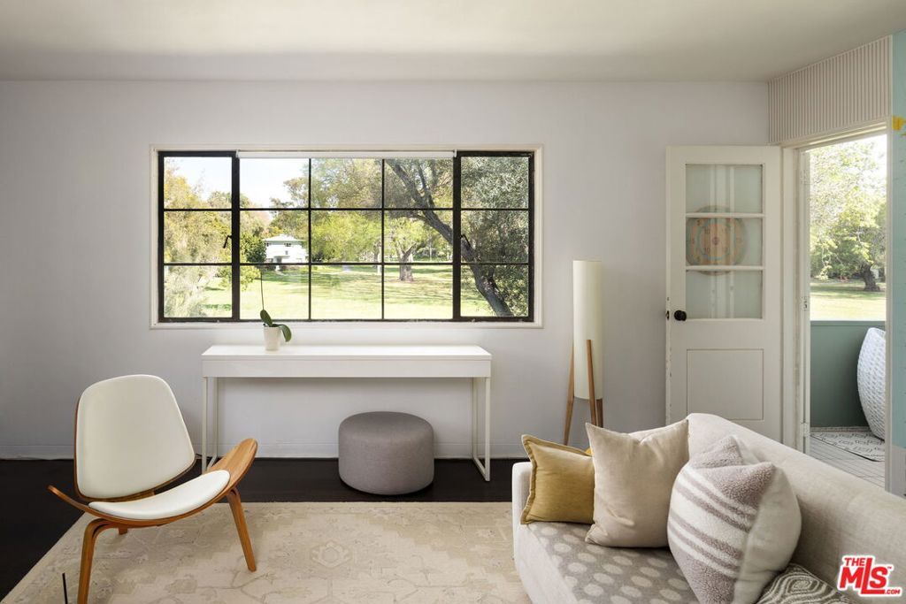 Photo of 5587 Village Grn, Los Angeles, CA 90016 (MLS # 26663009)