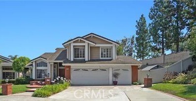 THIS IS THE HOME! LOCATED IN BEAUTIFUL SANTIAGO HILLS AT THE END OF A QUIET CUL DE SAC. THIS HOME FEATURES POOL/SPA, 3 CAR GARAGE, 4 BEDROOMS (ALL UPSTAIRS), REMODELED KITCHEN WITH GRANITE COUNTER TOPS, SPACIOUS FAMILY ROOM WITH FIRE PLACE, GREAT EATING AREA ADJACENT TO KITCHEN, SPIRAL STAIRCASE, LARGE LIVING ROOM AND FORMAL DINING. THE BACK YARD IS VERY LARGE AND GREAT FOR ENTERTAINING. FEATURES INCLUDE POOL/SPA, BUILT IN BBQ AND GREAT PATIO. WALKING DISTANCE TO CHAPMAN HILLS ELEMENTARY, PETERS CANYON, PARKS, SHOPPING, AND FREEWAYS. NO MELLO ROOS OR HOA. SOLAR (LEASED)