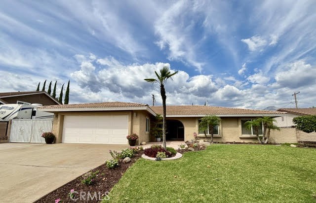 Welcome to 1099 Sullivan Street – a beautifully maintained 4-bedroom, 2-bath home in the heart of Upland! This charming single-story residence features arched doorways, exposed wood beams in the living room, and a spacious, light-filled layout perfect for both everyday living and entertaining. The private backyard offers a sparkling pool, while the front yard features mature apple and persimmon trees for added character and seasonal enjoyment. Additional highlights include an attached garage and a prime location close to schools, parks, shopping, and easy access to the 210 Freeway. Don’t miss this incredible opportunity to own a move-in ready home full of charm and style.