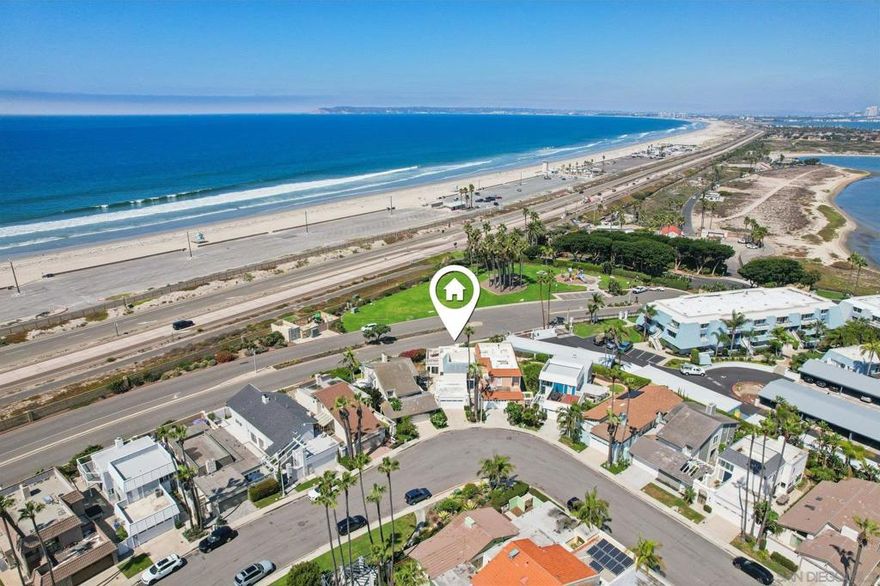 Located in the highly desirable Jamaica Village community of Coronado Cays, this beautifully maintained 2-bedroom, 2.5-bath home offers the perfect blend of California indoor-outdoor living and resort-style amenities. Just a short walk to the beach, this home showcases 180-degree panoramic ocean views, including spectacular sunsets over Point Loma and the Coronado Islands. Inside, you’ll find two spacious primary suites—each with its own en suite bath—plus a family room, den, and sunroom filled with natural light. The upstairs retreat and private deck provide the ideal vantage point for evening sunsets, while upgraded spaces embrace seamless indoor-outdoor flow. Step outside to lush landscaping and a private backyard designed for entertaining, complete with inviting deck spaces to enjoy cool coastal breezes. The attached 2-car garage offers convenience and storage. As a resident of Jamaica Village, you’ll enjoy access to a private beach, swimming pool, and clubhouse with BBQ—perfect for gatherings and relaxing weekends. Blending comfort, style, and coastal charm, this Coronado Cays home embodies the best of San Diego beachside living.  Located in the highly desirable Jamaica Village community of Coronado Cays, this beautifully maintained 2-bedroom, 2.5-bath home offers the perfect blend of California indoor-outdoor living and resort-style amenities. Just a short walk to the beach, this home showcases 180-degree panoramic ocean views, including spectacular sunsets over Point Loma and the Coronado Islands. Inside, you’ll find two spacious primary suites—each with its own en suite bath—plus a family room, den, and sunroom filled with natural light. The upstairs retreat and private deck provide the ideal vantage point for evening sunsets, while upgraded spaces embrace seamless indoor-outdoor flow. Step outside to lush landscaping and a private backyard designed for entertaining, complete with inviting deck spaces to enjoy cool coastal breezes. The attached 2-car garage offers convenience and storage. As a resident of Jamaica Village, you’ll enjoy access to a private beach, swimming pool, and clubhouse with BBQ—perfect for gatherings and relaxing weekends. Blending comfort, style, and coastal charm, this Coronado Cays home embodies the best of San Diego beachside living.