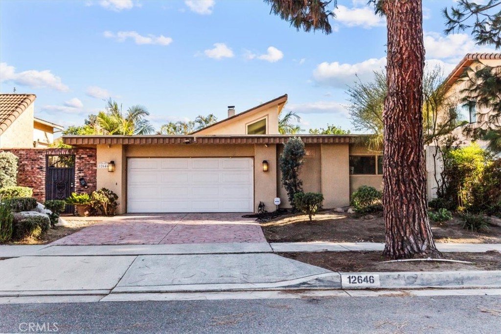 12646 Beach Street, Cerritos California 90703
For Lease
This beautiful single-level home currently available in Greenbrook, Cerritos—a sought after community known for its prime location near award-winning schools, parks, dining, shopping, and quick access to the 91 & 605 freeways is your place to find peace and tranquility away from the hustle and bustle of the city.
Inside are soaring cathedral ceilings and walls of windows fill the home with natural light. The spacious open floor plan features a large living room with fireplace and atrium access, a family room with built-in BBQ, and a remodeled chef’s kitchen with Sub-Zero refrigerator, double ovens, granite counters, center island, and custom cabinetry. The primary suite includes a spa-like bath, mirrored closet organizers, and sliding doors that open to a private jacuzzi patio. Additional bedrooms include custom built-ins and skylights.
Upgrades throughout include recessed lighting, dual-pane windows, new sliding glass doors, granite bathrooms with skylights, and professional landscaping. The private wraparound yard is perfect for entertaining with multiple patios, built-in BBQ island, fountain, and spa. A two-car attached garage offers direct access, built-in cabinets, and roll-up door.
This rare single-level gem blends comfort, style, and convenience—don’t miss your chance to rent and live in one of Cerritos’ most sought-after neighborhoods.
at:
12646 Beach Street, Cerritos California 90703