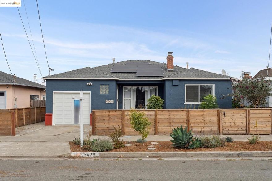 Welcome to this well-maintained 3BD/1BA home located in the heart of North and East Richmond. Offering 1,163 SF (per tax records), this inviting residence blends comfort & functionality.  Step into a spacious kitchen ideal for cooking & gathering, while double-pane windows throughout most of the home provide energy efficiency & abundant natural light. The recently remodeled bathroom adds a modern touch to the home’s character.  Enjoy the benefits of sustainable living with solar panels & Tesla EV charger. The expansive backyard offers ample room for outdoor enjoyment & potential for an Accessory Dwelling Unit (ADU).  Conveniently located near local parks, transit, & freeways, a fantastic opportunity for homeowners or investors alike.